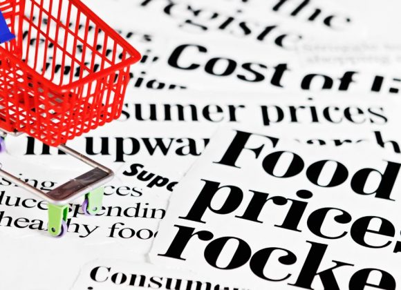 shopping cart with text that says food prices sky rocket