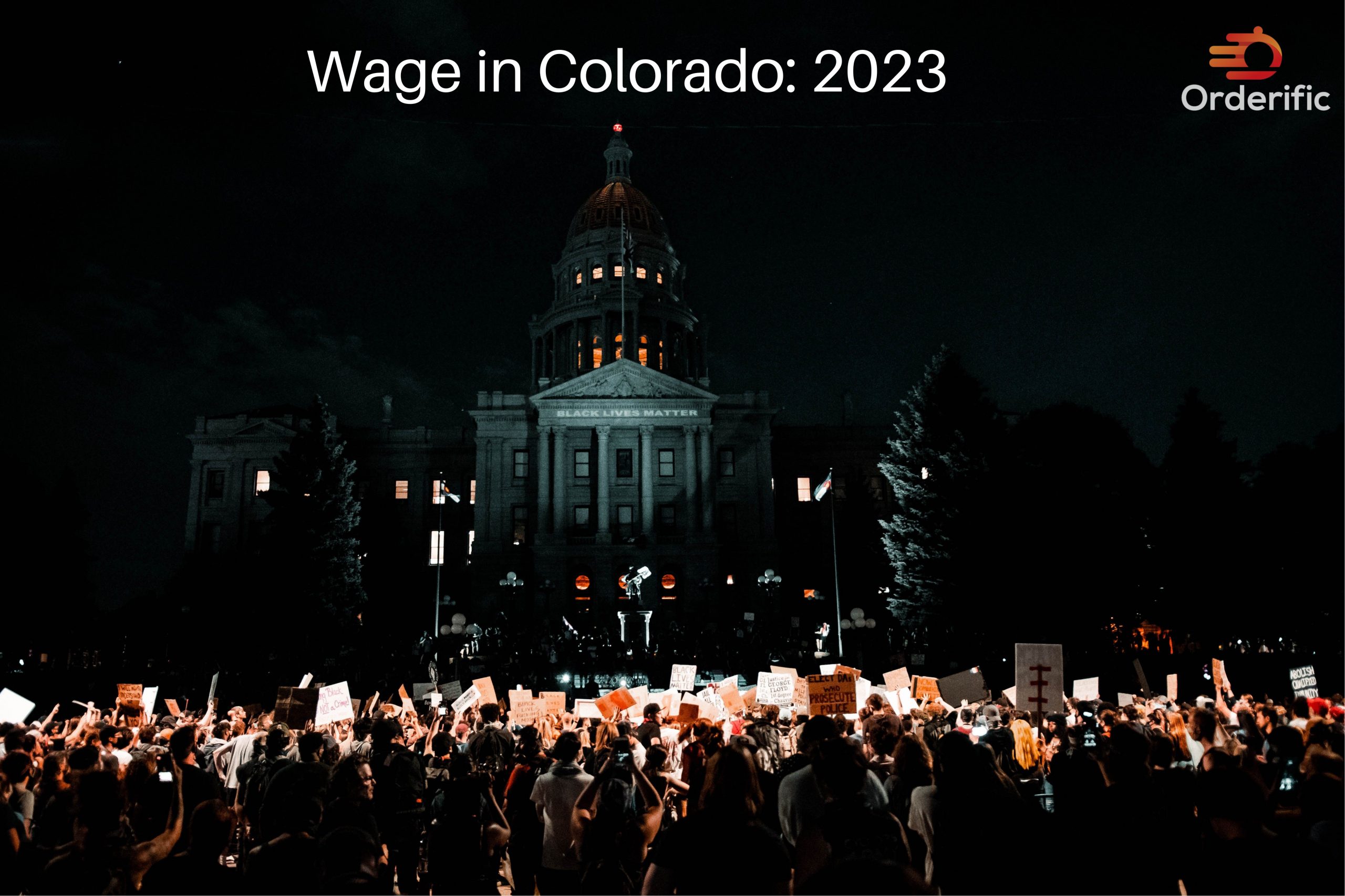 Colorado's 2023 Minimum Wage: crowd infront of Denver City Council Building, Colorado